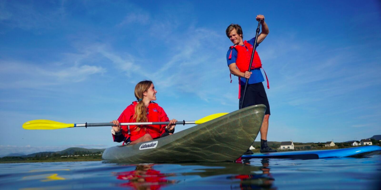 kayak and paddle board side by side